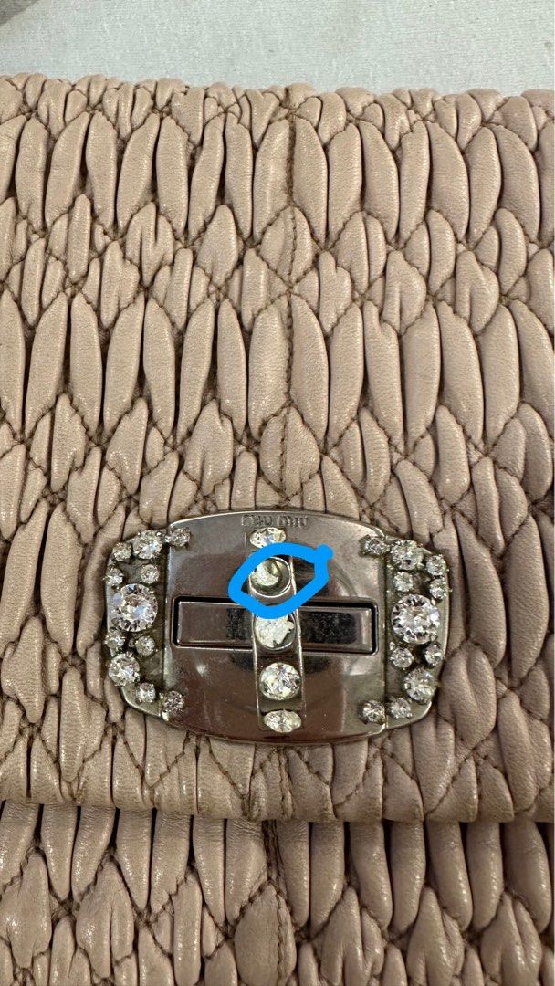 Shoulder bag/ messenger bag (Category: Shoulder Bags) located in Taguig. Submitted by nala123 (Listing ID 1459855386, Image 2). Description: Authentic bought in the US, lightly used with missing stone but not noticeable. Pls see pics. Shipping c/o buyer. No return no exchange..