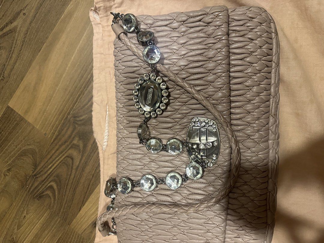 Shoulder bag/ messenger bag (Category: Shoulder Bags) located in Taguig. Submitted by nala123 (Listing ID 1459855386, Image 3). Description: Authentic bought in the US, lightly used with missing stone but not noticeable. Pls see pics. Shipping c/o buyer. No return no exchange..
