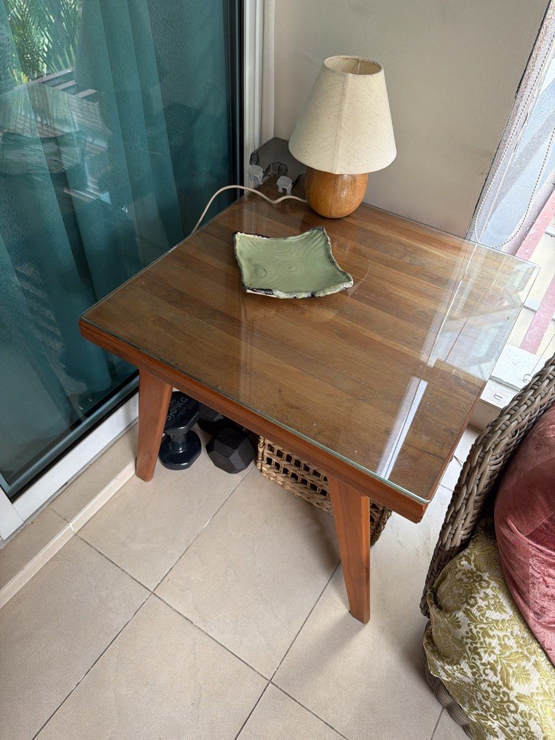Side table (Category: Tables & Sets) located in Singapore. Submitted by kind_trader (Listing ID 1459707820, Image 2). Description: It can be used as a side or coffee table with a glass top cover to elevate the look. Sturdy and strong table can take weight. Lightly used as aside table in the balcony. Looking to renovate our balcony so need to give it away.