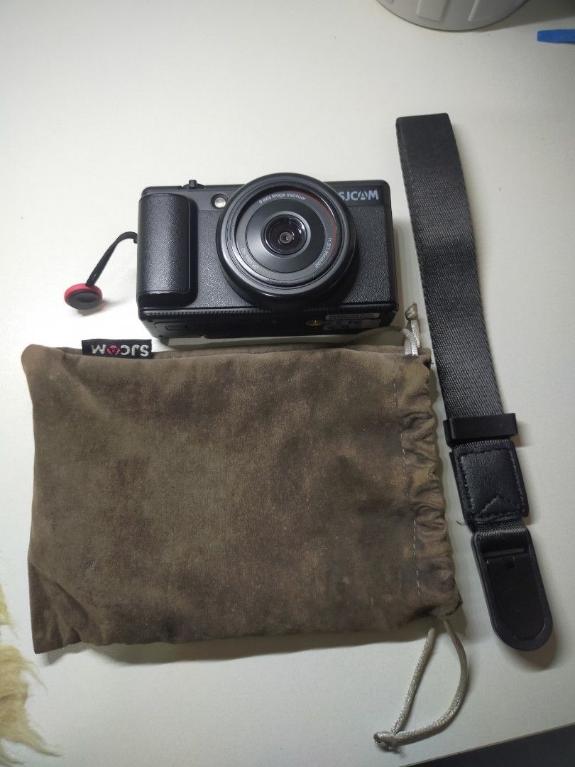 SJCAM 5K Action Camera with 6-Axis Image Stabilizer (Category: Cameras) located in Santo Tomas. Submitted by zenzenzennaya (Listing ID 1458536838, Image 1). Description: - Shoot in crystal-clear 5K resolution - Experience ultra-smooth footage with 6-axis image stabilization - Effortlessly frame your shots using the convenient flip-out screen - Compact and portable design for on-the-go adventures - Perfect for capturing all your exciting moments n