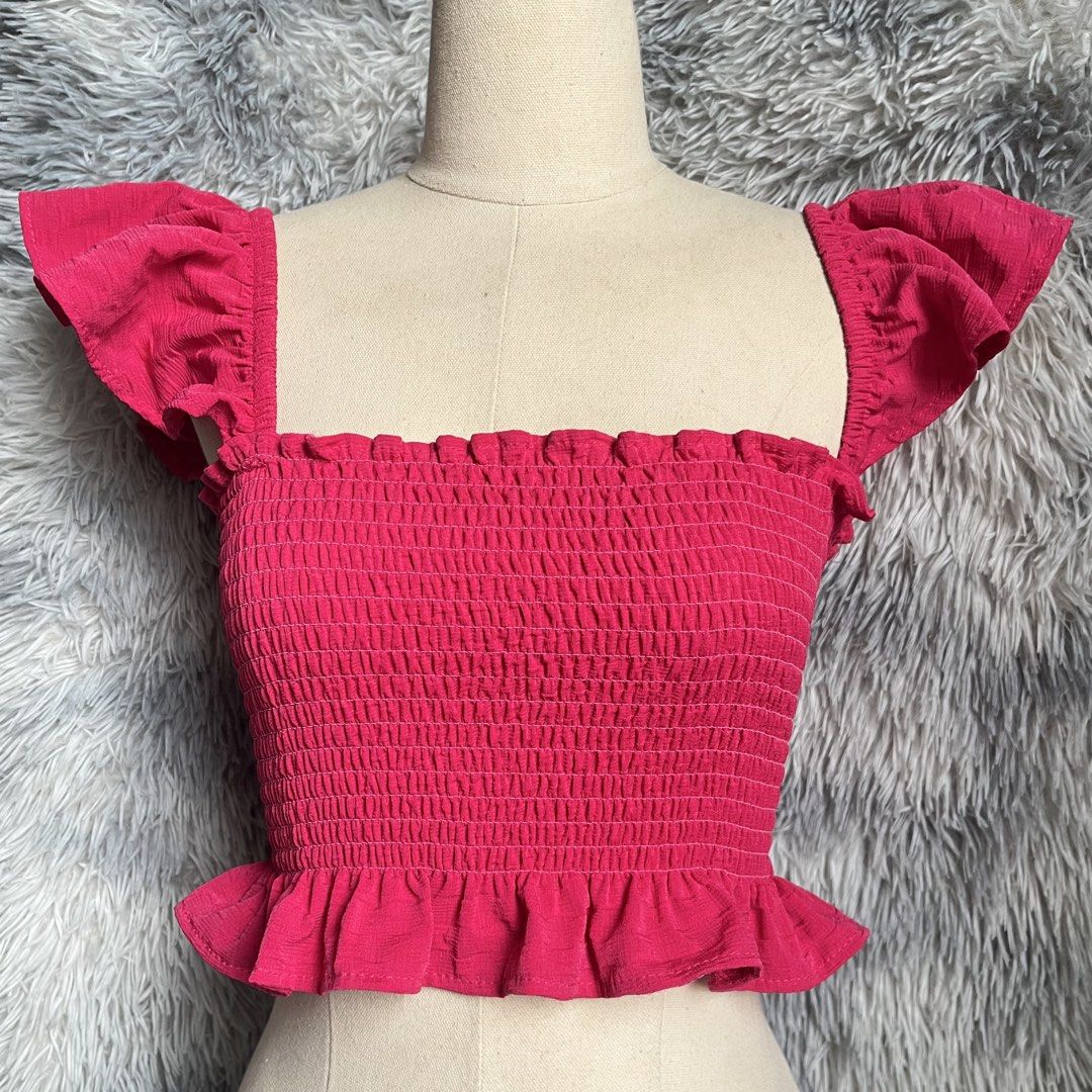 Smocked Square Neck Crop Top with Ruffle Sleeves (Category: Blouses) located in Manila. Submitted by trish.b (Listing ID 1459689326, Image 2). Description: Size: XS-Medium Available in White and Hot Pink Brandnew | ₱100 each.