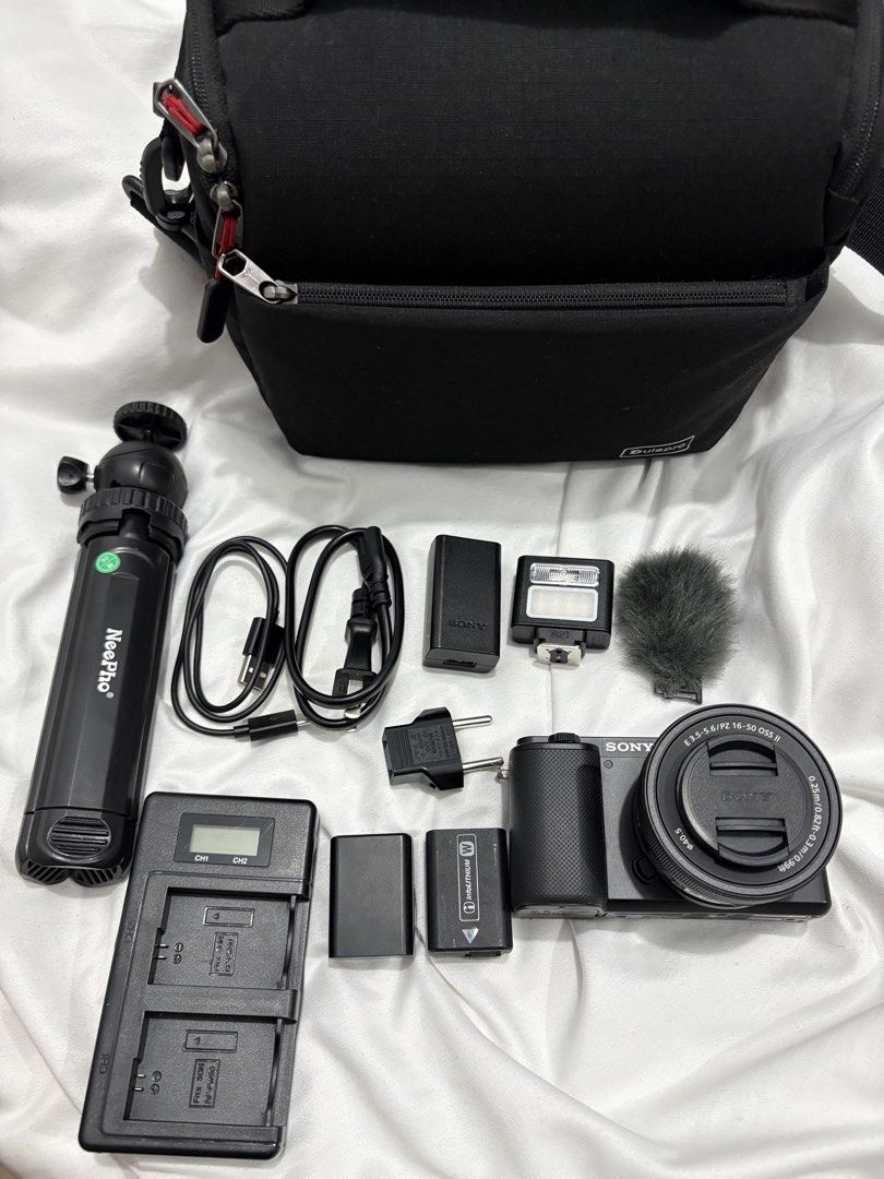 Sony Alpha ZV-E10 Mirrorless Camera with Kit Lens & Accessories (Category: Cameras) located in Bustos. Submitted by bigbite08 (Listing ID 1459879046, Image 2). Description: - Sony Alpha ZV-E10 Camera - E PZ 16-50mm OSS Lens - 2x Batteries - Charger - Small Tripod Grip - Hot Shoe Flash - Mini Microphone with Windscreen - Camera Bag - Original Box - Ideal for Vlogging & Photography.