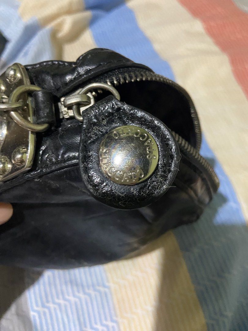 STACCATO Black Leather Quilted Chain Shoulder Bag (Category: Shoulder Bags) located in Tarlac. Submitted by pangz0918 (Listing ID 1459809044, Image 3). Description: - Brand: STACCATO - Material: Black Leather - Design: Quilted - Hardware: Silver turn-lock closure and chain strap - Straps: Silver chain strap and a longer leather strap - Compartments: Zippered main compartment with interior zippered pocket - Condition: Shows some signs of wear on l