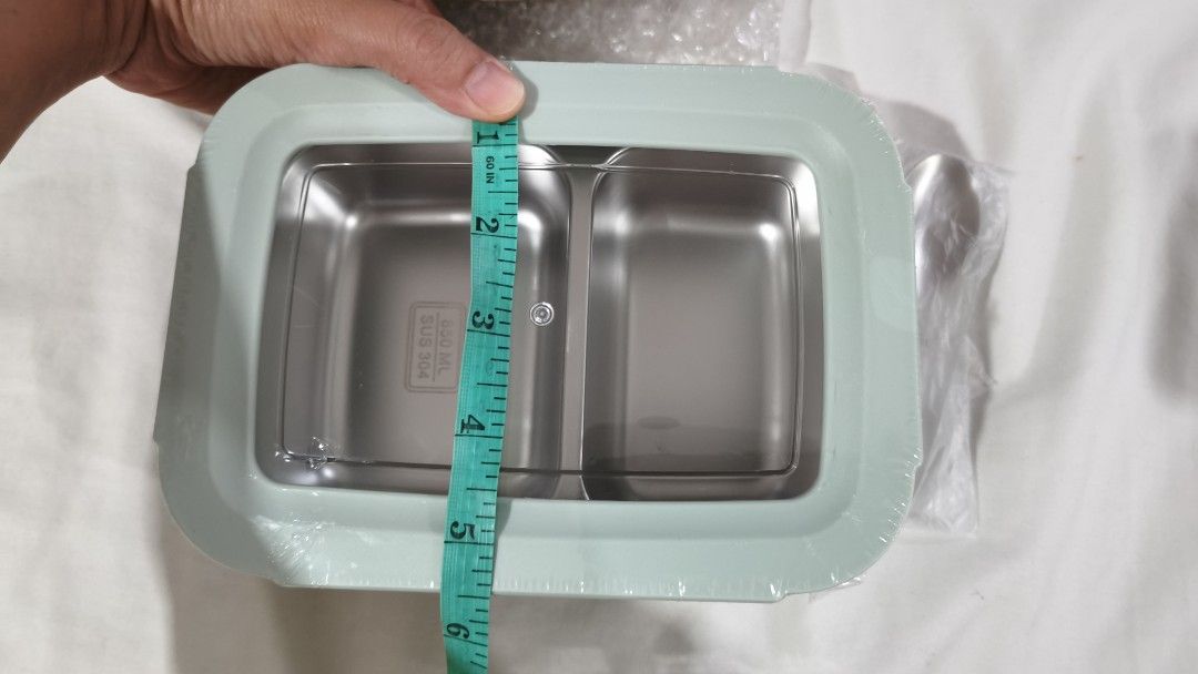 stainless steel lunch box with divider (Category: Food Organization & Storage) located in Pasig City. Submitted by nicspicksss (Listing ID 1459773368, Image 1). Description: ✓ brand new ✓ leak-proof ✓ comes with foldable stainless steel spoon and fork ✓P658 in orange app ✓ selling for P500 ✓ pastel green color ✓ very nice and has thick high quality material (we have the 350ml) ✓ rfs: accidentally chose the wrong size. i need the smaller one (530m