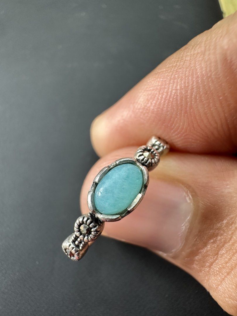 Sterling Silver Turquoise Marcasite Ring Size 6 (Category: Rings) located in Daet. Submitted by thrifthings2018 (Listing ID 1459738171, Image 1). Description: - Sterling silver ring - Features a light blue stone - Delicate floral band with marcasite accents - Size 6 - Weighs 2.31 grams - Ideal for stacking or as a standalone piece.