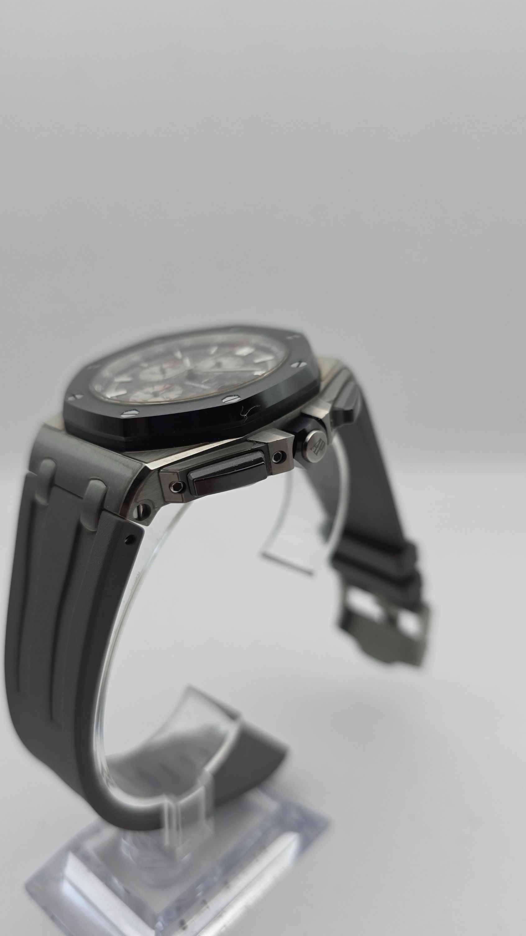 STICKERED Audemars Piguet AP Royal Oak Offshore Reverse Panda Chronograph Novelty 26400IO.OO.A004CA.01 26400IO 44mm Titanium Grey Full Set (Category: Watches) located in Singapore. Submitted by jingleman (Listing ID 1459737819, Image 3). Description: Bold on the wrist, impossible to miss. 🩶 Covered in protective stickers. A proper wrist statement from AP, bold, sporty and effortlessly cool. All while keeping it light and comfortable with that ti