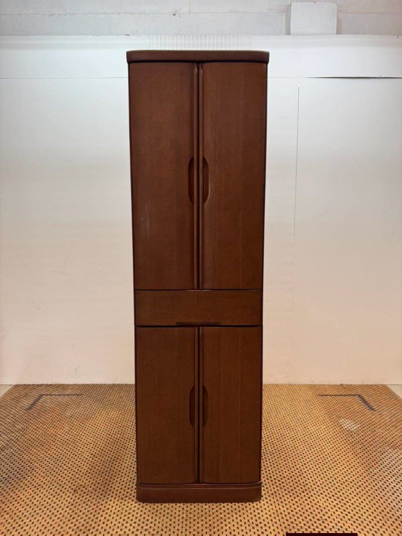 Storage Cabinet (Category: Shelves, Cabinets & Racks) located in Meycauayan. Submitted by marygracecasimiro (Listing ID 1459709880, Image 1). Description: Vintage Tall Wooden Storage Cabinet with Drawer Price: 12,500 L23.5 x W23 x H80 In good condition♥️ It has a slim vertical design, four-door storage, multiple adjustable shelves, and a center drawer, making it suitable for clothing, linens, dishes, books, or general household storage..