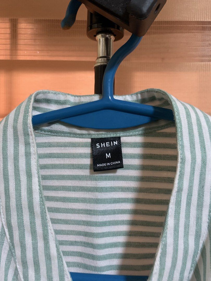 Stripe Green Long sleeve Formal (Category: Formal Shirts) located in Santa Rosa. Submitted by ronelgabriel (Listing ID 1459803155, Image 3). Description: Length 29.5 Width 23 Shoulder 25.5.
