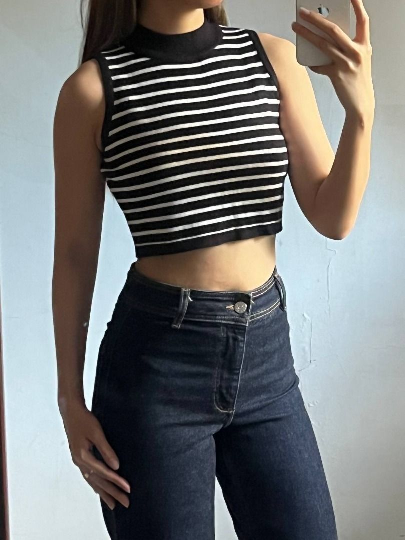 Striped Sleeveless Top (Category: Sleeveless) located in Caloocan City. Submitted by fishfilei (Listing ID 1459788120, Image 2). Description: Details: • Versatile piece that can be paired with jeans or skirts • Super stretchy material • Fits up to medium • For reference: I have a 23-inch waist and 32-inch bust Mode of Payment (MOP): • GCash • BDO / BPI / Metrobank • Bank transfer via QR code Mode of Delivery (MOD): • J&T • Lalamove / Grab Express