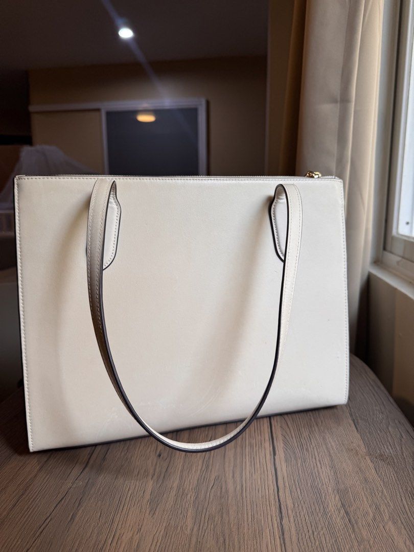Structured Coach Tote in Cream (Category: Tote Bags) located in Bacolod City. Submitted by SOLunaStellar (Listing ID 1459715776, Image 2). Description: Bought in Gotemba, Japan in 2025. With receipt and paper-bag. Medium-Large. Signs of normal wear. Still pretty in person. SRP around 24,000php Bought it at 50% Off for 12,000php. I still have the receipt 😊 Negotiable for sure buyers. RFS: Pregnancy Fund 💕.