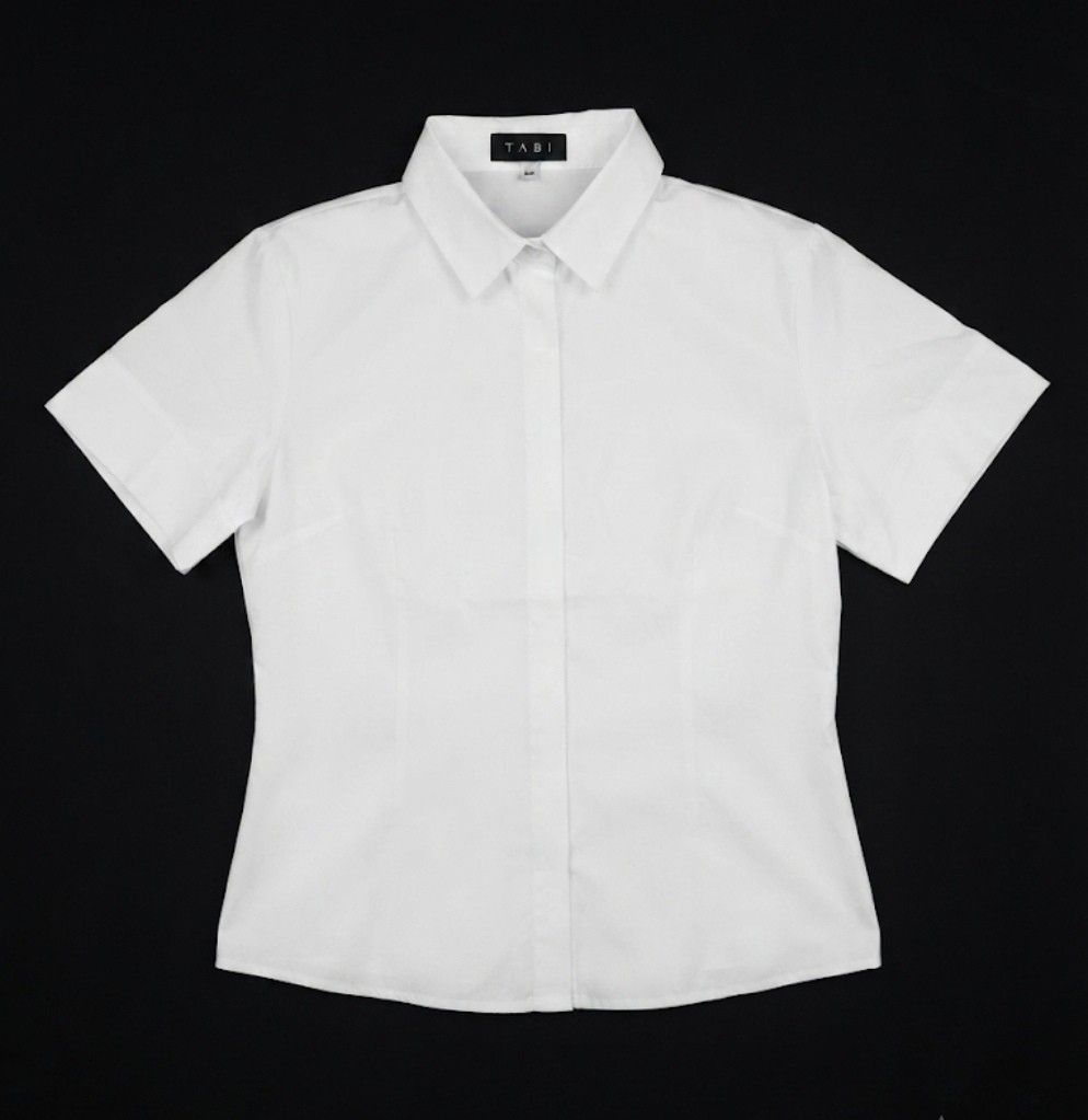 TABI herringbone weave White Short Sleeve Button Up Shirt (Category: Shirts) located in Donsol. Submitted by saksthriftavenuebyluckymaria8 (Listing ID 1459867405, Image 1). Description: - Classic white short sleeve shirt - Brand: TABI - Features: Button-up front, collar - Style: Simple, clean, sharp, neat - Versatile: Great for work or casual wear, easy to pair with anything TABI HERRINGBONE WEAVE PATTERN WHITE sz 39 fits M chest 20in length 24in