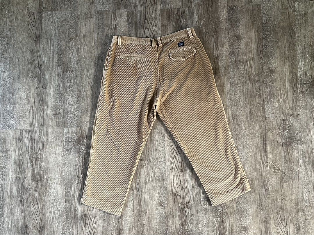 Trucker Tan Corduroy Pleated Pants (Category: Trousers) located in Cebu City. Submitted by rap.declutter (Listing ID 1459787396, Image 2). Description: - cropped to 36” - Tan corduroy pants - Pleated front - Relaxed fit - Two back pockets - Classic, everyday style - Versatile color.
