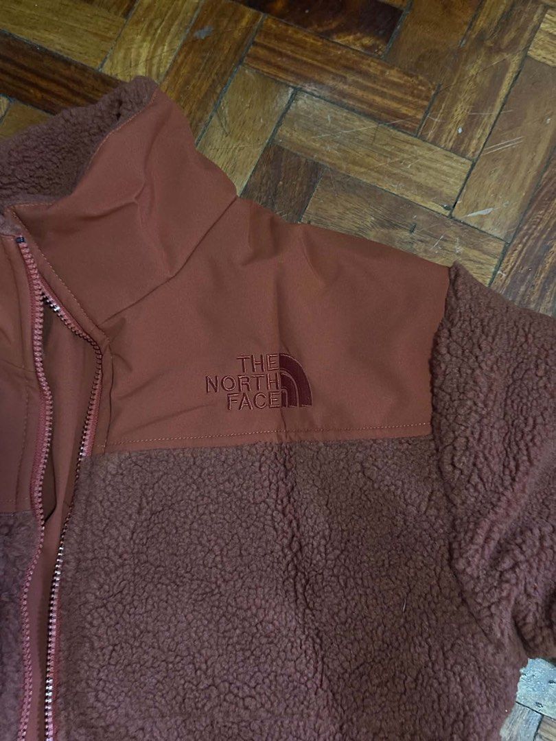 The North Face Fleece Jacket - Brown (Category: Coats, Jackets and Outerwear) located in Makati City. Submitted by kriscelity (Listing ID 1459800678, Image 3). Description: The North Face Sherpa Fleece Jacket Brown | Excellent Condition The North Face Sherpa Fleece Jacket Color: Brown/Rust Condition: Excellent / well-kept Thick and warm sherpa fleece material Full zip closure, high collar, zip pockets Embroidered The North Face logo No obvious ma