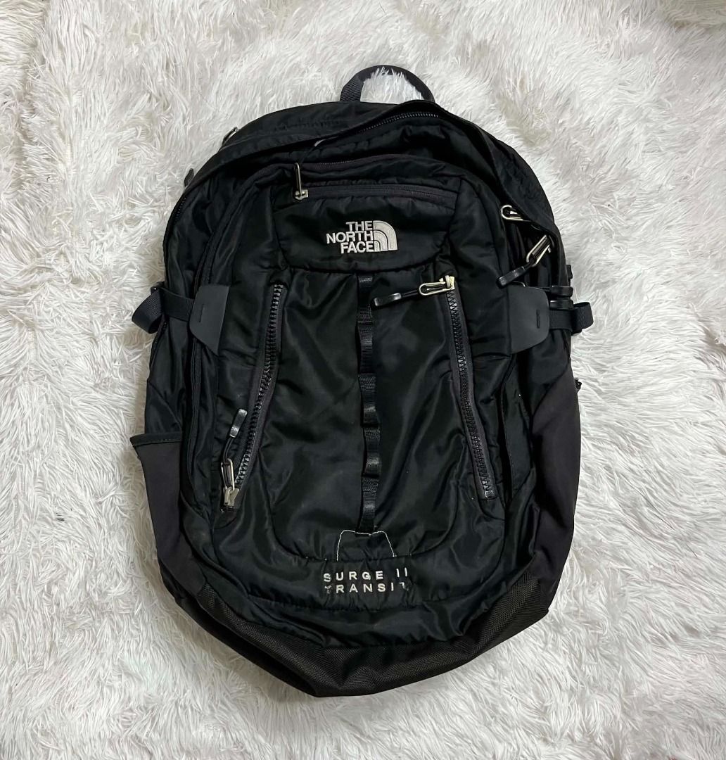 The North Face Surge 2 Black Backpack (Category: Backpacks) located in Manila. Submitted by senggggg. (Listing ID 1459872869, Image 1). Description: good condition working zip minimal sign of use scratch check detail pic and size.