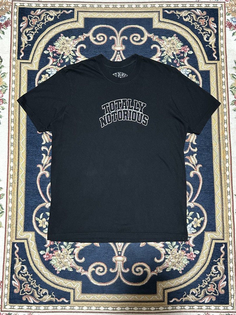 Threats ‘Totally Notorius’ Tee (Category: Tshirts & Polo Shirts ) located in Manila. Submitted by blessed.drei (Listing ID 1459816867, Image 1). Description: Excellent Condition Width : 21 Length : 28 ₱500 + Shipping 📍 Manila .