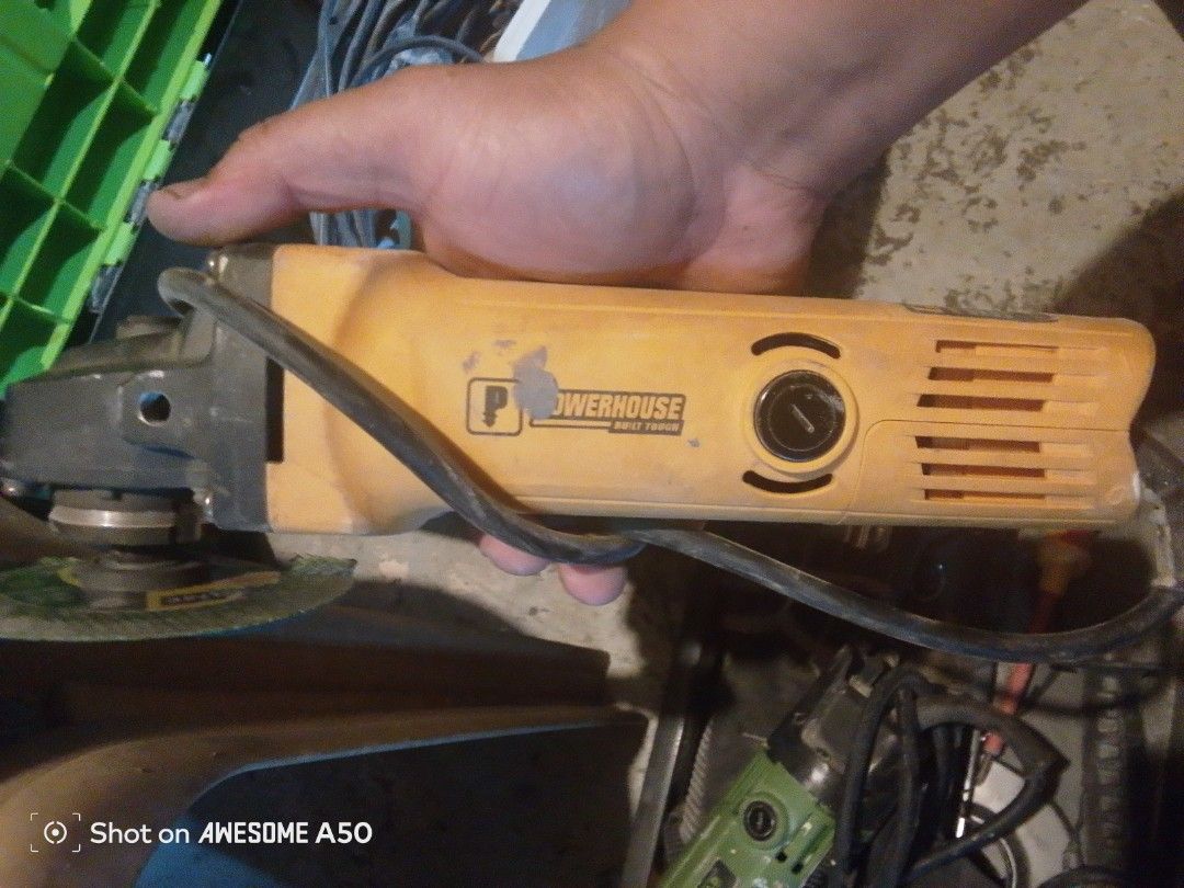 Tile cutter and grider (Category: Construction Tools & Equipment) located in Manila. Submitted by amielivan028361 (Listing ID 1459796776, Image 1). Description: .