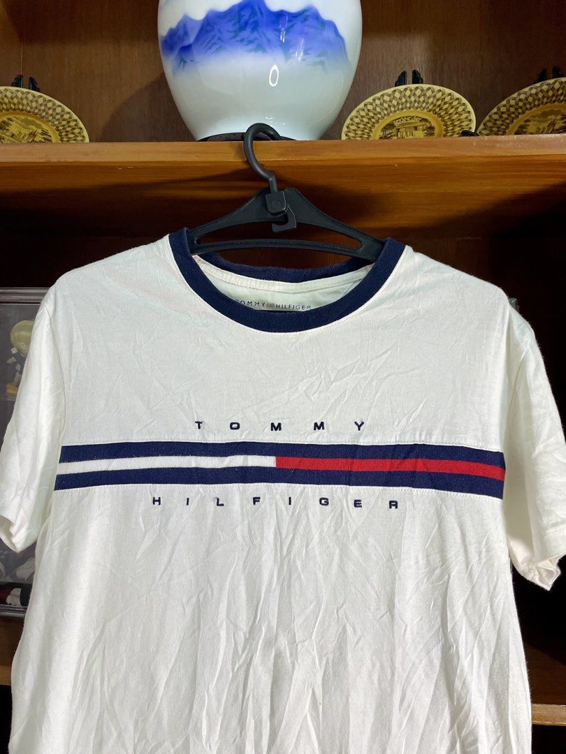 Tommy Hilfiger (Category: Tshirts & Polo Shirts ) located in Davao. Submitted by the_rare_hustla (Listing ID 1459718432, Image 2). Description: TOMMY HILFIGER Issue Washable Stain Need Wash Only Color rate 10/10 Width - 20 Length - 25 Size M on tag Fit To Med-Large Dm If Interested!.