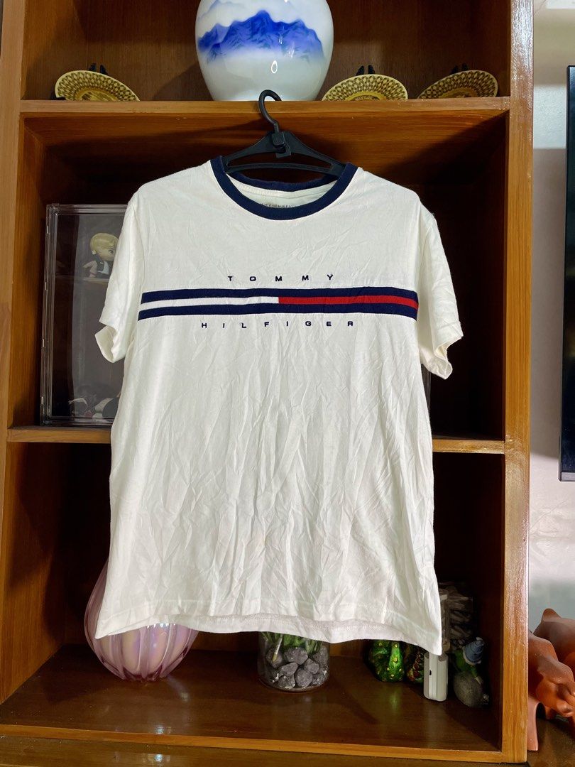 Tommy Hilfiger (Category: Tshirts & Polo Shirts ) located in Davao. Submitted by the_rare_hustla (Listing ID 1459718432, Image 1). Description: TOMMY HILFIGER Issue Washable Stain Need Wash Only Color rate 10/10 Width - 20 Length - 25 Size M on tag Fit To Med-Large Dm If Interested!.