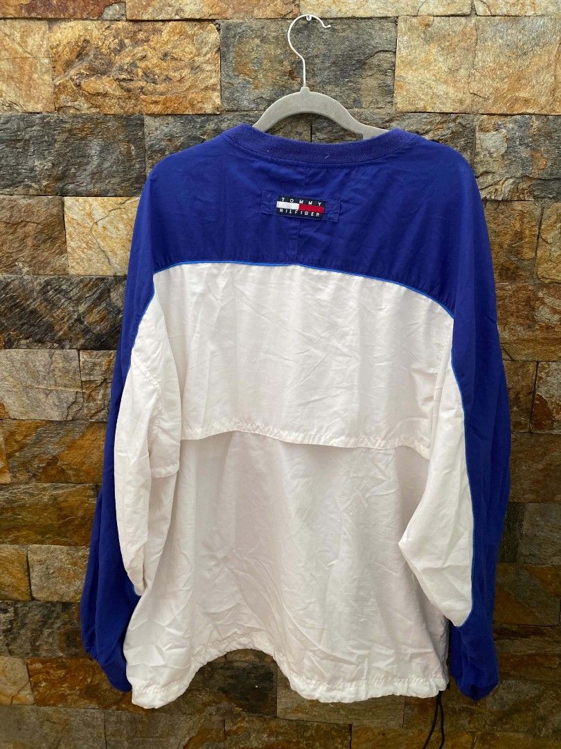 Tommy Hilfiger Athletics Windbreaker (Category: Coats, Jackets and Outerwear) located in Manila. Submitted by asiongmx (Listing ID 1459724308, Image 2). Description: - Tommy Hilfiger Windbreaker Jacket - Color: Blue and White - Size: XL - Features Tommy Hilfiger logo on chest pocket and sleeve - Ideal for casual wear or sports activities * Decluttering.