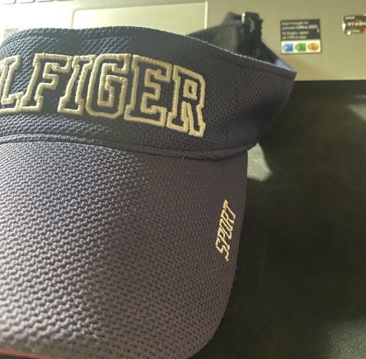 Tommy Hilfiger Sport Visor Cap (Category: Caps & Hats) located in Manila. Submitted by bd10eclutters (Listing ID 1459884360, Image 2). Description: - Navy blue Tommy Hilfiger visor - White 'Hilfiger' embroidery on the front - 'Sport' embroidered on the side - Adjustable strap at the back - Ideal for sunny weather.