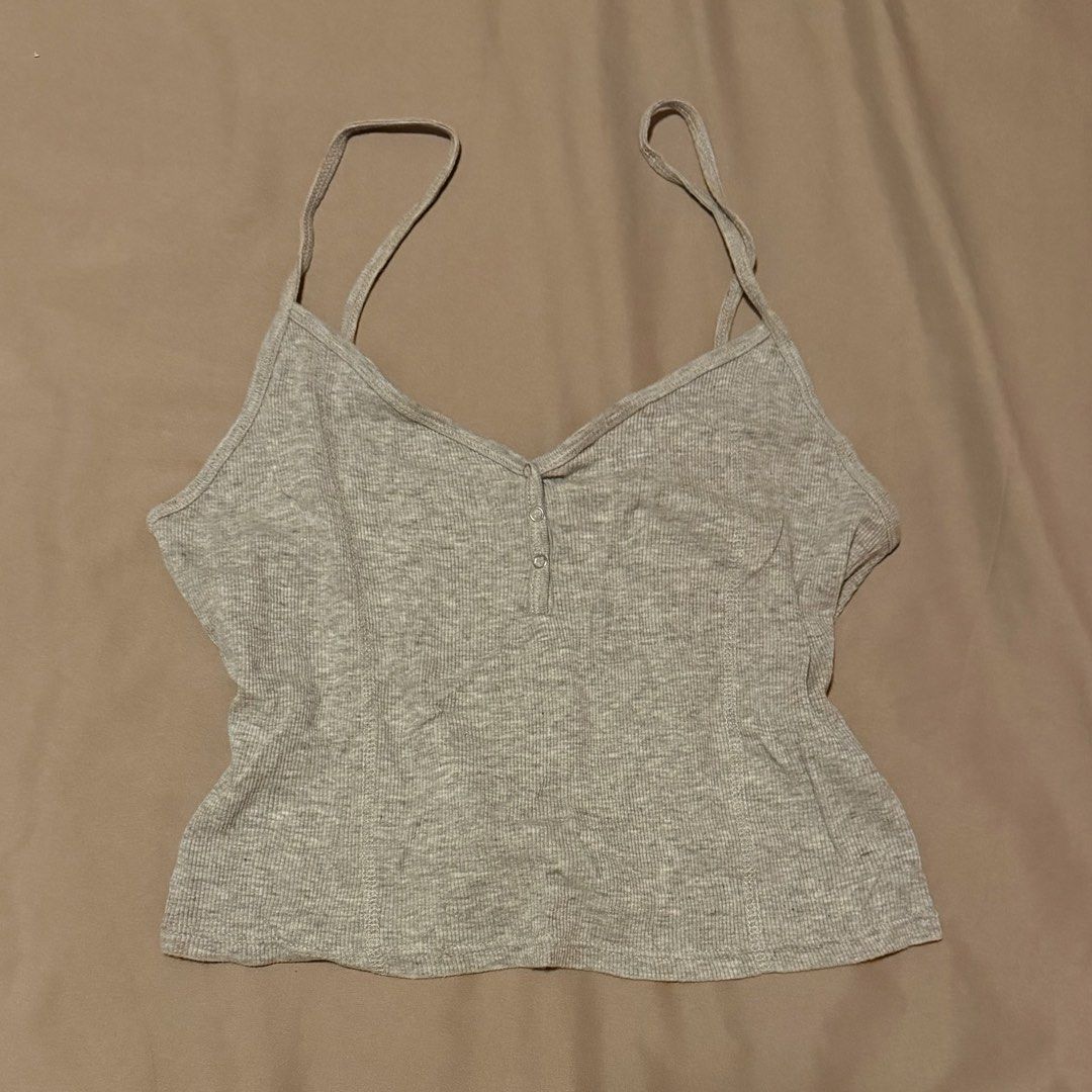 Topshop Grey Ribbed Button Front Camisole Tank Top (Category: Sleeveless) located in Manila. Submitted by gabskkasells (Listing ID 1459851372, Image 1). Description: Cute but no longer using this! RFS: Decluttering.