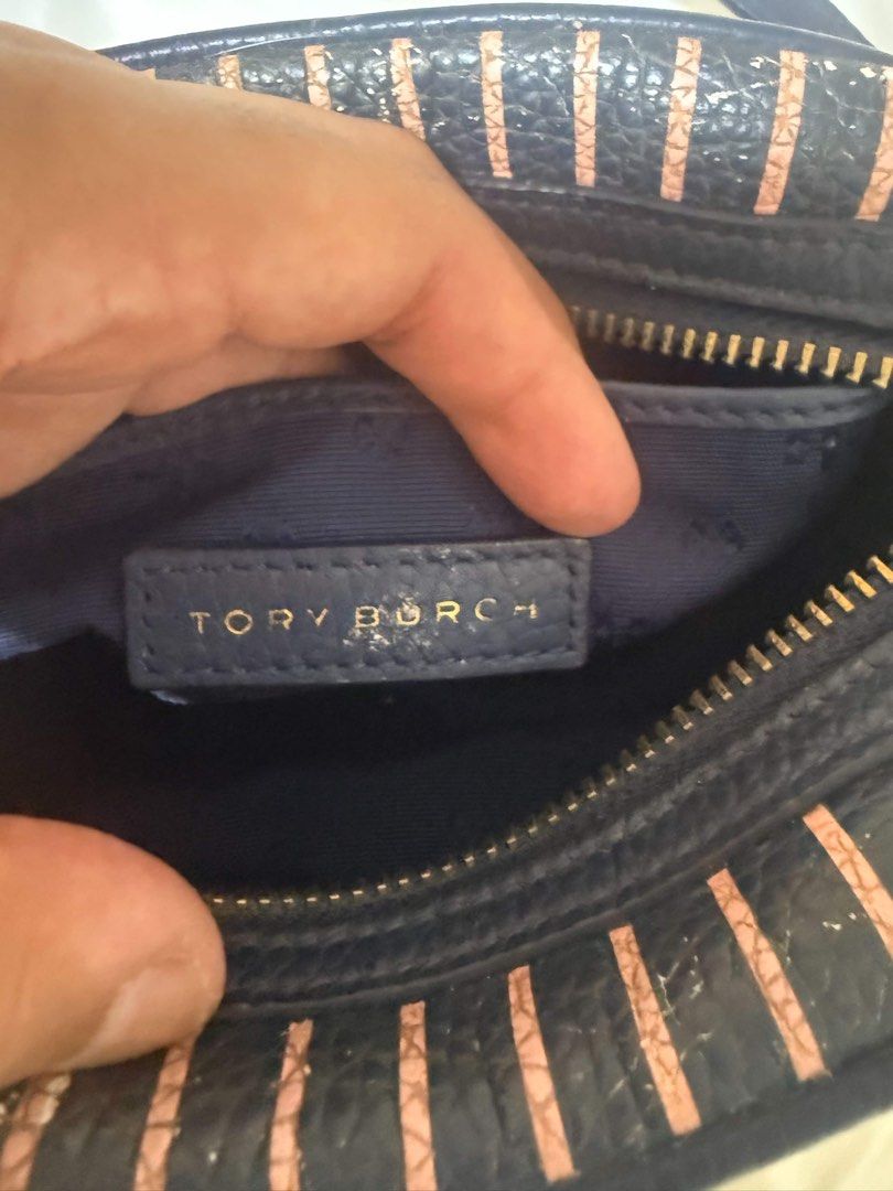 Tory Burch Striped Bag (Category: Cross-body Bags) located in Caloocan City. Submitted by angelala17 (Listing ID 1459726853, Image 2). Description: • Original Tory Burch design • Multicolor striped pattern • Spacious interior • Gold-tone hardware • Pre-loved, good condition.