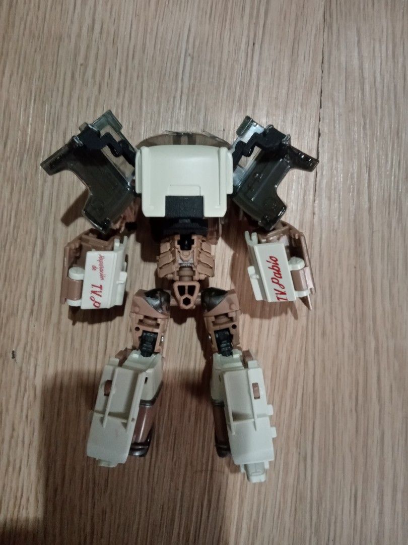 Transformers Studio Series 108 ROTB Wheeljack with upgrade kit. (Category: Vehicle & Diecast Models) located in Manila. Submitted by zenfish.8a8bb6 (Listing ID 1459828500, Image 3). Description: Selling Transformers Studio Series 108 Wheeljack action figure with upgrade kit Description - Transforms into a Volkswagen van. - Includes original packaging. - Van has "TV Pablo" printed detail. - accessories: G1 laser blaster (original), two cannons (up