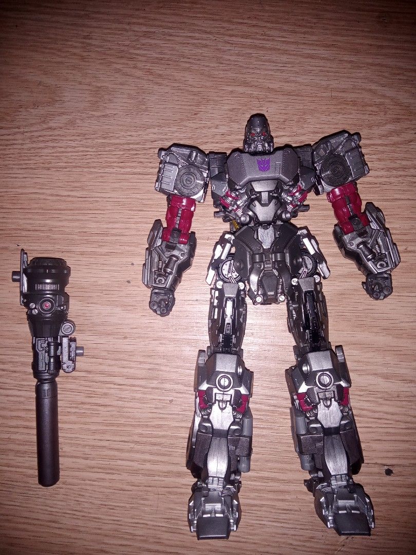 Transformers Studio Series 109 Concept Art BB Megatron with Custom Paint (Category: Figurines & Statues) located in Manila. Submitted by zenfish.8a8bb6 (Listing ID 1459827264, Image 3). Description: Selling Studio Series 109 Concept Art Megatron (Bumblebee) Description - original made from Hasbro, not KO or BAIWEI - good condition, still transformable - with custom-painted metallic silver, grey, red, and gold paint apps with detailed reference on