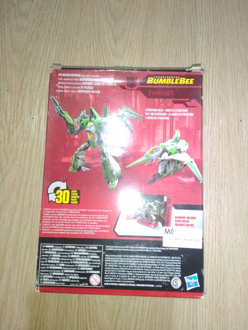 Transformers Studio Series 76 Voyager Class Thrust (Category: Action & Battle Toys) located in Manila. Submitted by zenfish.8a8bb6 (Listing ID 1459840007, Image 2). Description: Selling Transformers Studio Series 76 Voyager Class Thrust Description - original made from Hasbro - Transforms into a Cybertronian Jet - Includes original packaging. - accessories: two missile cannon, arm blaster - no damaged and issue with box, backdrop, and instruction