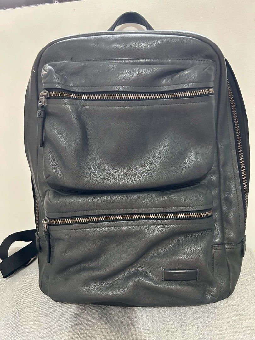 Tumi Grayish Black Leather Backpack (Category: Backpacks) located in Imus. Submitted by justinelouis (Listing ID 1459792760, Image 1). Description: .
