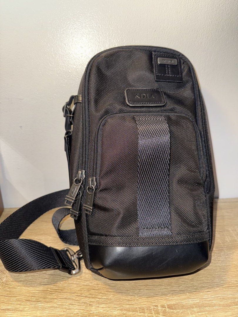 Tumi Fife Slim Sling Bag (Category: Sling Bags) located in Paranaque City. Submitted by Daniel. (Listing ID 1459781800, Image 2). Description: - Authentic Black Tumi Sling Bag - Made with durable nylon and premium leather accents - Features multiple zippered compartments for excellent organization - Adjustable strap for a comfortable, customized fit - Perfect for daily commutes or your next travel adventure.