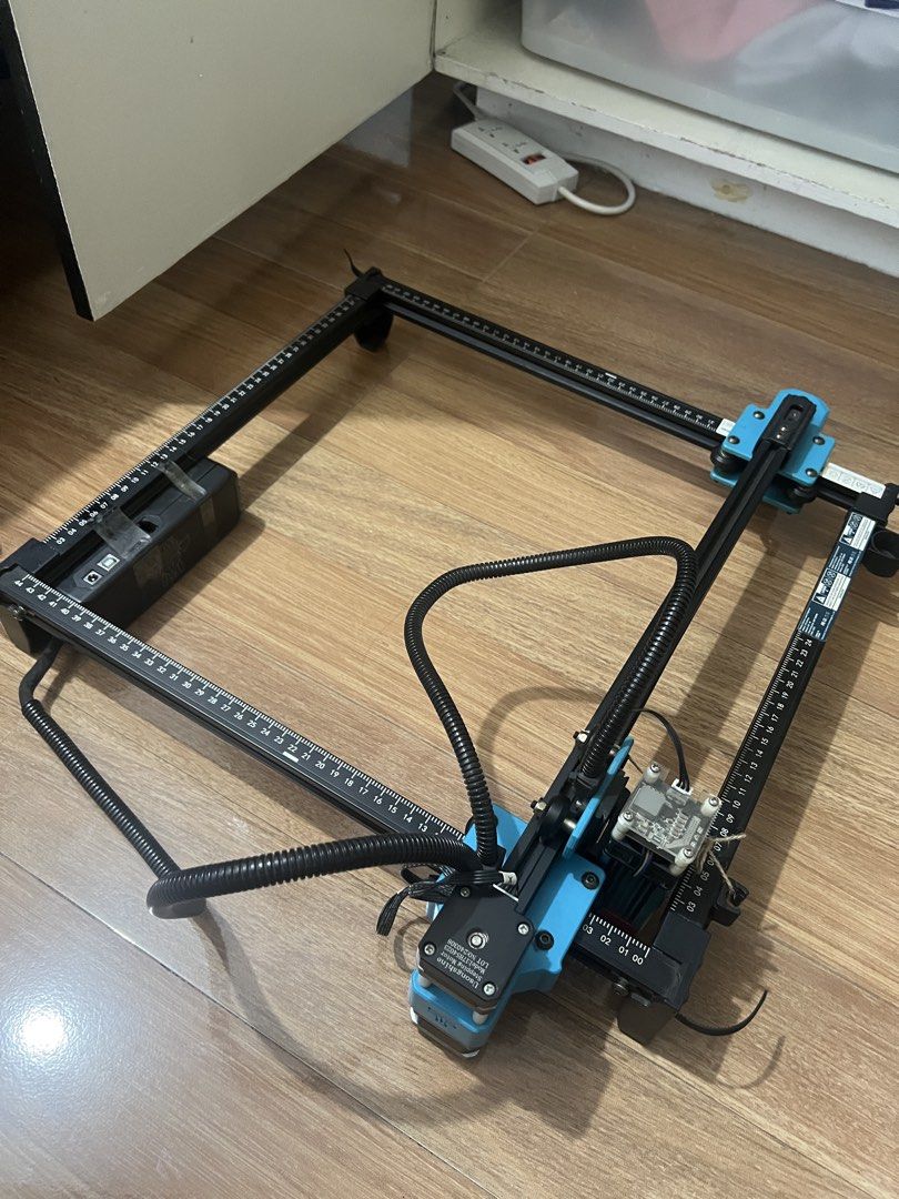 Two Trees Laser Engraver (Category: Office & Business Technology) located in Santo Tomas. Submitted by majajajan (Listing ID 1459735910, Image 1). Description: - Usongshine Stepping Motor - Model: 17HS3401SD - Lot No: 240308 - Good working condition - used for wood and leather engravings - laser is well maintained and was replaced last year (2025) - fan is detach to avoid leather smoke pero pwede ibalik sa dating pwesto -rfs: nakatambak na lang. 