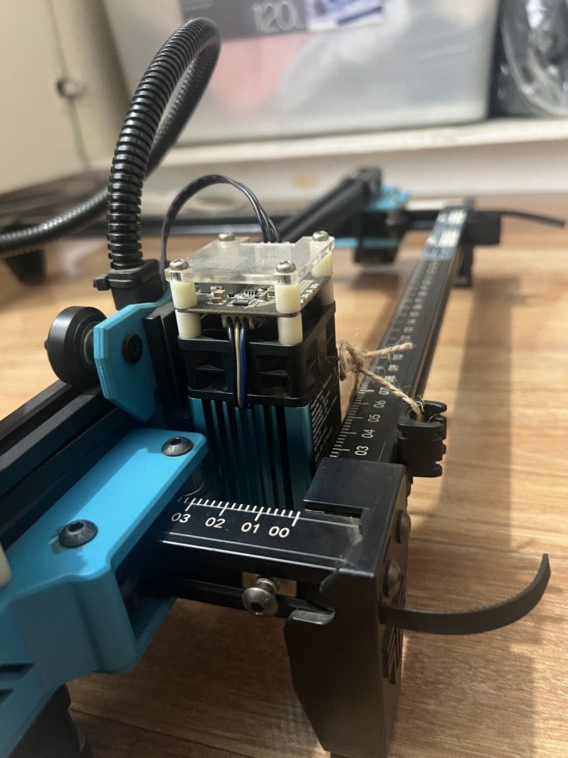 Two Trees Laser Engraver (Category: Office & Business Technology) located in Santo Tomas. Submitted by majajajan (Listing ID 1459735910, Image 2). Description: - Usongshine Stepping Motor - Model: 17HS3401SD - Lot No: 240308 - Good working condition - used for wood and leather engravings - laser is well maintained and was replaced last year (2025) - fan is detach to avoid leather smoke pero pwede ibalik sa dating pwesto -rfs: nakatambak na lang. 