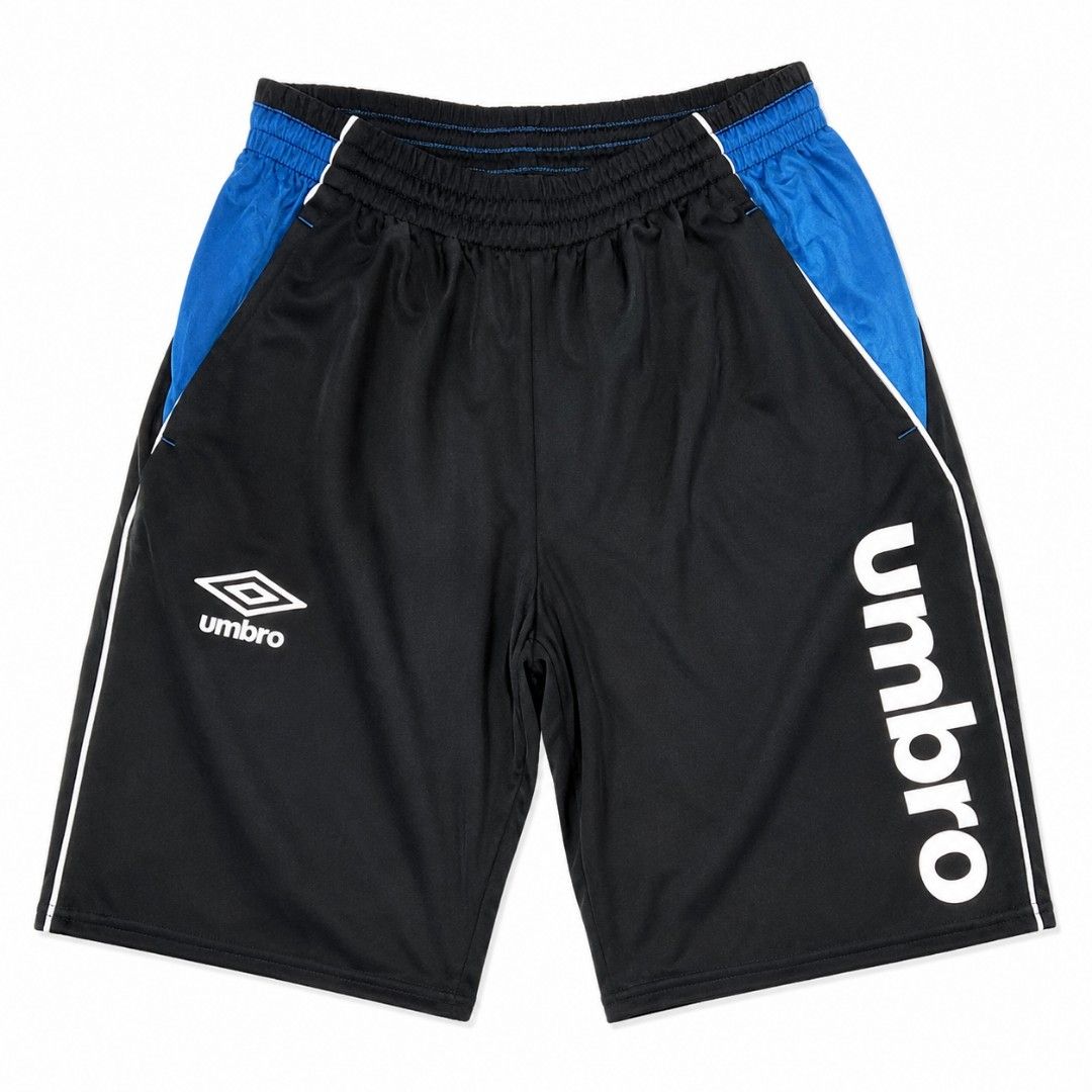 Umbro Black & Blue Athletic Shorts (Category: Shorts) located in Manila. Submitted by chieezz (Listing ID 1459701258, Image 1). Description: - Brand: Umbro - Color: Black with blue accents - Features: Umbro logo on left leg, large Umbro text on right leg - Waistband: Elastic with drawstring - Ideal for: Sports and casual wear.