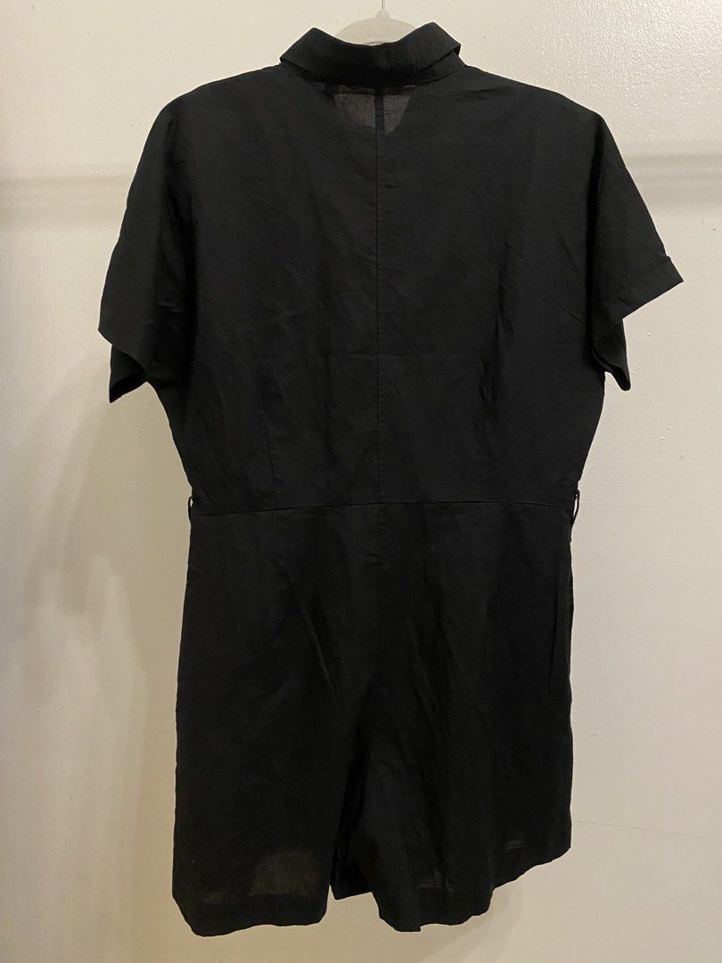 Uniqlo Romper (Category: Rompers) located in San Pablo. Submitted by fbyriri51927 (Listing ID 1459791001, Image 2). Description: - Uniqlo black short sleeve romper - Collared neckline - Button-up front - Cinched waist with belt loops - Relaxed fit shorts - Ideal for casual outings and relaxed days.