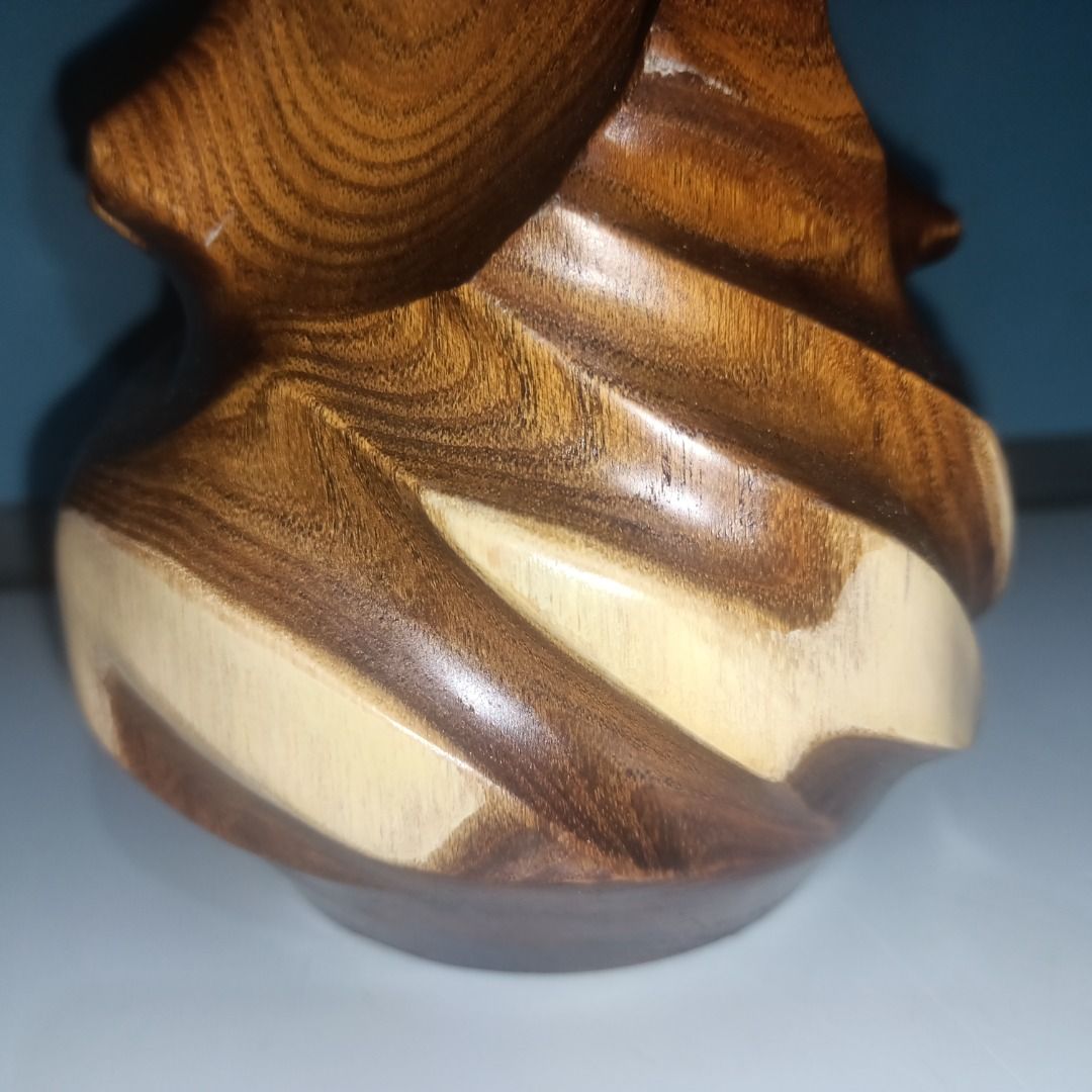 Unique Carved Wooden Vase (Category: Vases & Decorative Bowls) located in Munoz. Submitted by larryc1212 (Listing ID 1459821197, Image 3). Description: - Hand-carved wooden vase - Unique abstract design - Beautiful natural wood grain (rich brown & lighter tones) - Hollow interior, ideal for dried flowers or as a decorative piece - Approx. 8.25 inches tall - Adds a natural, artistic touch to any space Disclaimer: Item may include some scratches du
