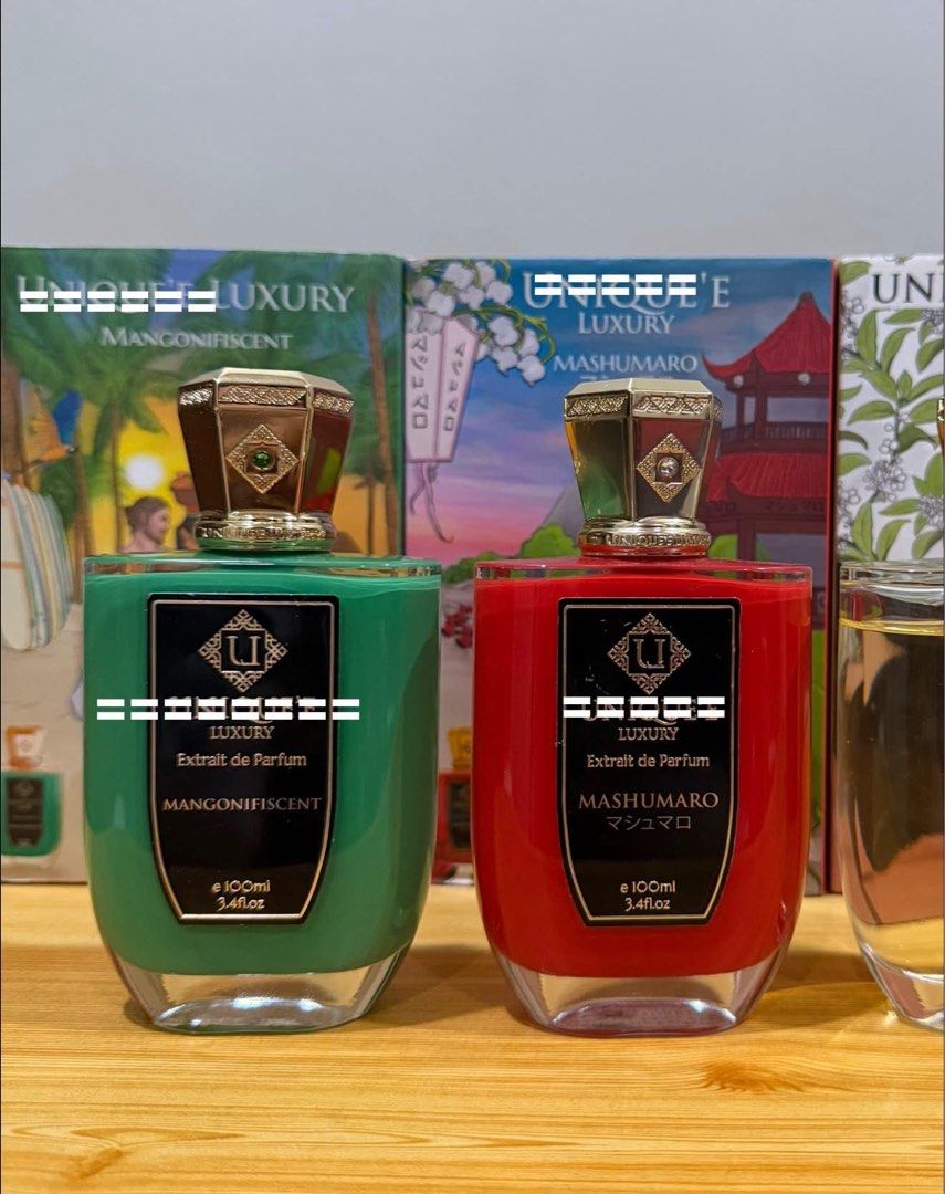 Unique Luxury Extrait de Parfum 100ml (Category: Fragrance & Deodorants) located in Quezon City. Submitted by rdecants (Listing ID 1459857929, Image 1). Description: - Two unique luxury perfumes: Mangonifiscent (green bottle) and Mashumaro (red bottle). - Both are 100ml Extrait de Parfum concentration for long-lasting fragrance. - Exquisite and captivating scents. - Original boxes included. - Perfect for gifting or personal indulgence..