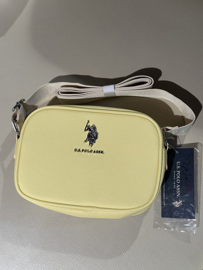 US POLO ASSN butter yellow bag (Category: Cross-body Bags) located in Quezon City. Submitted by declutter.yna (Listing ID 1459774603, Image 1). Description: .