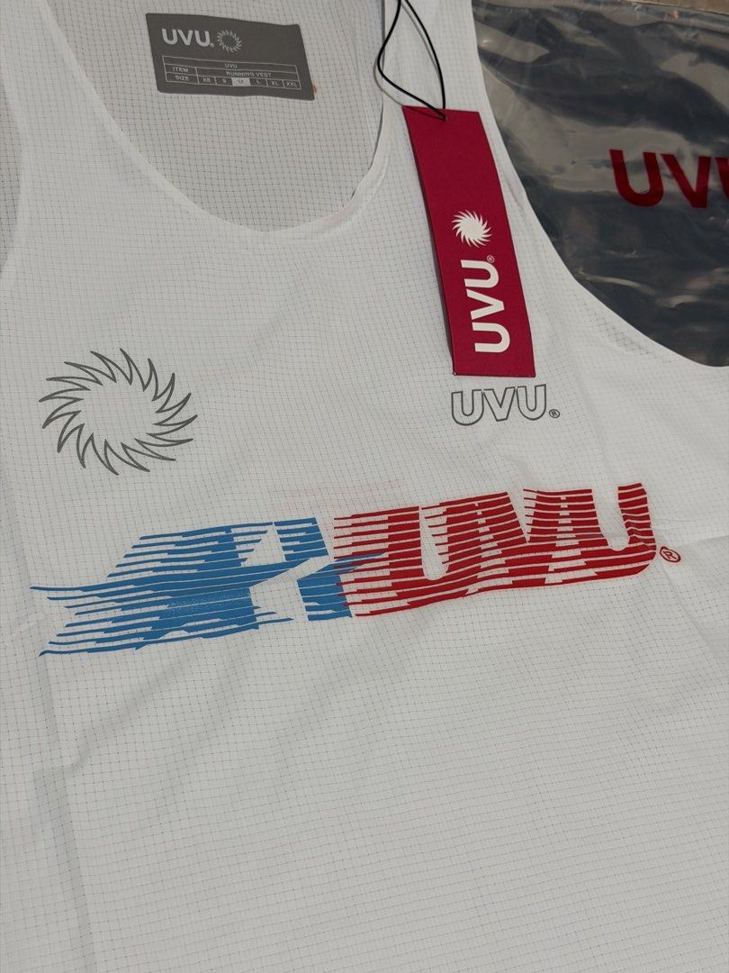 UVU Chicago 25 Singlet - White - Medium (Category: Activewear) located in Manila. Submitted by mnl.lvprdgci (Listing ID 1459728111, Image 2). Description: - UVU running vest - Color: White - Design: Chicago 25 - Ideal for racing - Includes original packaging - Perfect for your next run!.