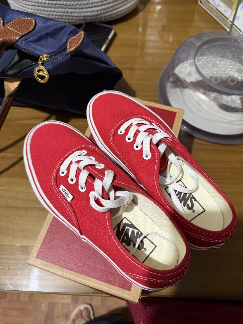 VANS SNEAKER (Category: Sneakers) located in Makati City. Submitted by beymadrigal (Listing ID 1459852920, Image 1). Description: size 7 - brandnew - Classic red Vans Authentic sneakers - Lace-up style with white laces - White sole - Vans logo visible on heel and insole - Staple for any casual outfit - Great for everyday wear.