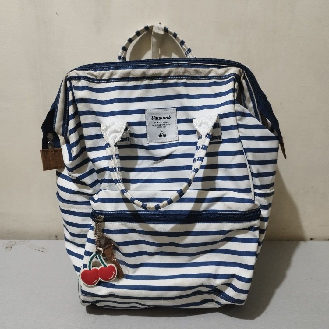 Vanwalk Striped Backpack with Cherry Charm (Category: Backpacks) located in Caloocan City. Submitted by love.aiden (Listing ID 1459868957, Image 1). Description: Cute blue and white striped Vanwalk backpack with front zip pocket, two side pockets, and a cherry charm. Spacious and perfect for daily use or travel..