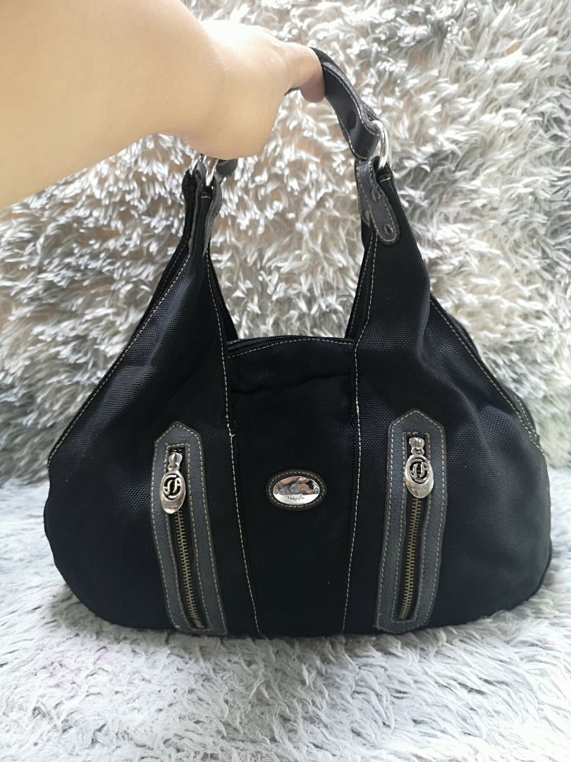 Vertical Zippered Front Pocket Shoulder Bag (Category: Shoulder Bags) located in Santa Cruz. Submitted by jmy_surplus.2 (Listing ID 1459720309, Image 1). Description: Size ; L- 11 W - 16 Color ; Black Type ; Shoulder bag Brand ; No brand Material ; Nylon Style ; Black nylon Shoulder Bag LR 165 JMY 4 Batch #220 AVAILABLE.