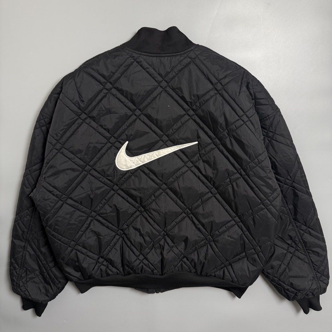 Vintage 90s Nike Black Reversible Bomber Jacket (Category: Coats, Jackets and Outerwear) located in Cebu City. Submitted by inukaybyjlf (Listing ID 1459690068, Image 3). Description: Condition: Excellent Issue: Small tear check last photo Dimension: 28x27.5 Best fit: XL Please refer to photos for actual condition..