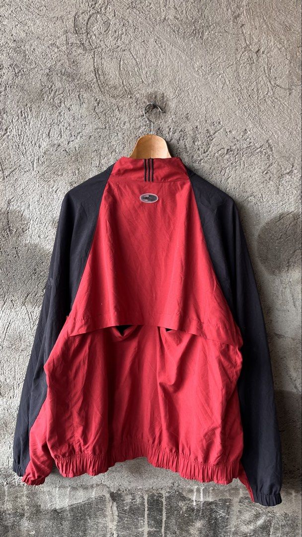 Vintage Adidas Track Jacket Red Black M/M (Category: Coats, Jackets and Outerwear) located in Cabuyao City. Submitted by bulandos (Listing ID 1459792365, Image 2). Description: - Adidas Track Jacket - Color: Red & Black - Closure: Quarter Zip - Sleeves: Raglan - Features: Elasticated cuffs and hem - Origin: Made in Cambodia - Size: Medium (M).