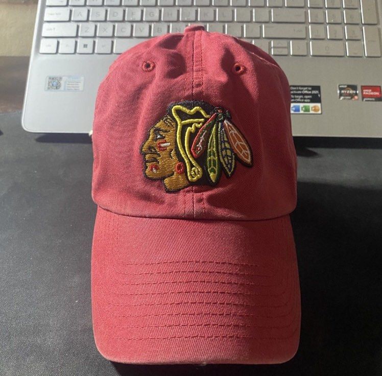 Vintage Chicago Blackhawks Red Baseball Cap (Category: Caps & Hats) located in Manila. Submitted by bd10eclutters (Listing ID 1459884286, Image 1). Description: - Red baseball cap - Features embroidered Chicago Blackhawks logo - Classic dad hat.