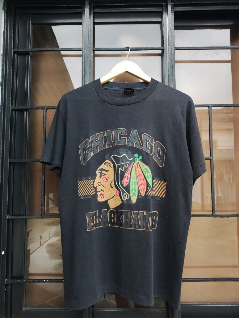 Vintage Chicago Blackhawks tee (Category: Tshirts & Polo Shirts ) located in Quezon City. Submitted by oldsoulv1 (Listing ID 1459795874, Image 1). Description: Vintage Chicago Blackhawks dimes: kindly check the last 2 slides issues: faded, crackprints 400 + SF Quezon City📍.