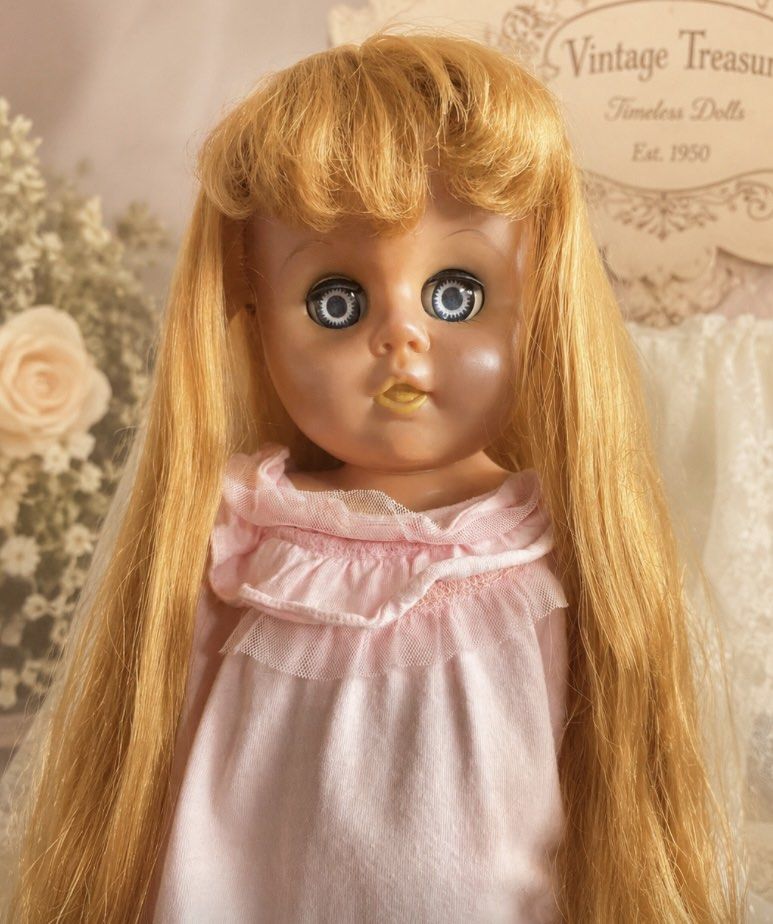 Vintage doll (Category: Kids Toys) located in Manila. Submitted by waltdisney10 (Listing ID 1459714089, Image 1). Description: - Vintage Timeless Treasures doll, established 1950. - Features long blonde hair and striking blue eyes. - Dressed in a charming pink ruffled nightgown. - A beautiful collectible piece, ideal for display. - PLEASE MANAGE ALSO YOUR EXPECTATION THIS IS NOT BRANDNEW PO..