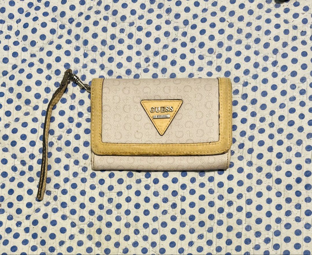 Vintage Guess Zipper Wallet (Category: Wallets & Card holders) located in Navotas City. Submitted by y2kikaystuff (Listing ID 1459859077, Image 1). Description: Vintage Guess Zipper Wallet Sign of usage Very presentable Not ukay Vintage condition Personal item from Japan From 350 down to 200 only.
