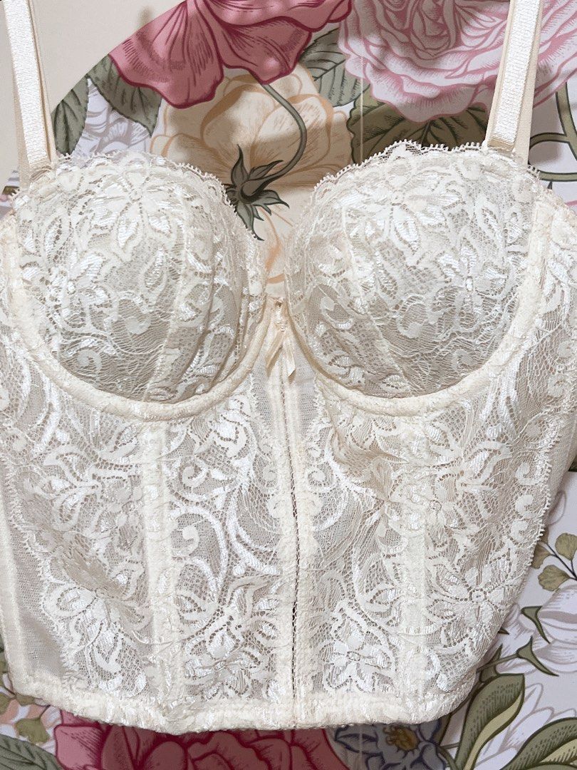 Vintage Lace Corset top (Category: Others Tops) located in Cavite. Submitted by wishie_collects (Listing ID 1459858398, Image 3). Description: A structured, sweetheart-neckline corset top with underwire cups, adjustable spaghetti straps, and a small decorative bow detail in the center. Size Xs-S.