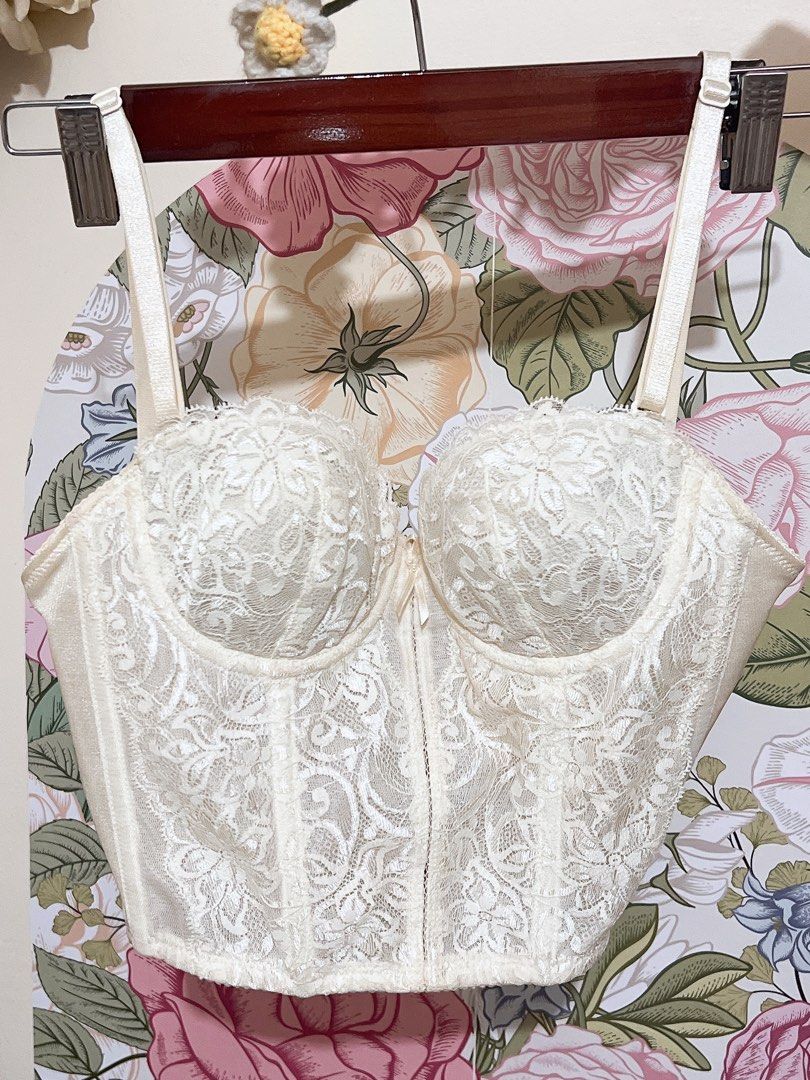 Vintage Lace Corset top (Category: Others Tops) located in Cavite. Submitted by wishie_collects (Listing ID 1459858398, Image 2). Description: A structured, sweetheart-neckline corset top with underwire cups, adjustable spaghetti straps, and a small decorative bow detail in the center. Size Xs-S.